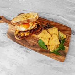 Egg caramelised onion toastie
